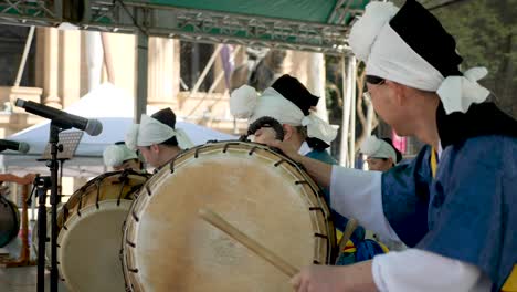 Korean-Musicians-Playing-Traditional-Korean-Drums-and-instruments-Samulnori-during-korean-festival