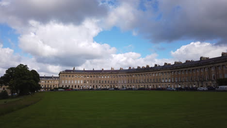 Time-Lapse-of-The-Royal-Crescent-in-Bath,-Somerset-on-a-Sunny-Summer’s-Day-with-Blue-Sky-and-White-Clouds-Moving-Overhead