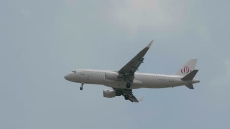 Jc-Airlines-Airbus-A320-214-Xu-998-Nähert-Sich-Vor-Der-Landung-Auf-Dem-Flughafen-Suvarnabhumi-In-Bangkok-In-Thailand