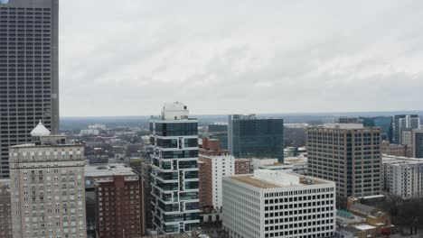 Drone-shot-above-Midtown-Atlanta-on-a-cloudy-day-after-a-storm