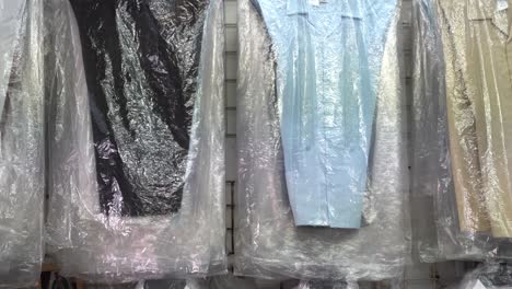 Camera-pans-up-showing-assortment-of-guayabera-men’s-shirts-in-a-shop-in-Merida-Mexico