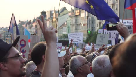 People-singing-national-anthem-during-demonstration,-Prague,-Czech-Republic