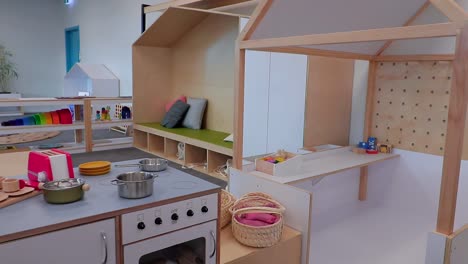 Reveal-shot-of-a-fantasy-kitchen-used-for-kids-education-in-a-Playcentre,-New-Zealand