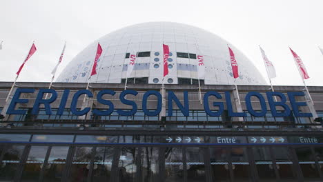 Ericsson-Globe-in-Stockholm,-tilt-cross-the-sky