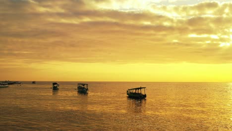 Silhouettes-of-Three-Tourist-Fishing-Boats-in-the-Arabian-Sea,-Indian-Ocean,-Goa,-India