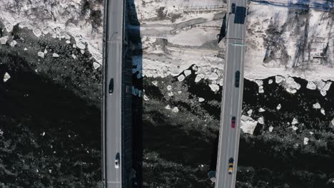 4k-Winter-River-Bridge-Eisberge-Vogelperspektive-Drohne_001