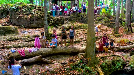 Aerial-shot-of-Filipino-children-playing-at-a-local-watering-hole-on-the-island-of-Bohol