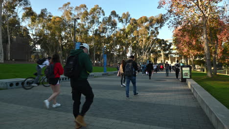 Young-students-walking-to-and-from-school-buildings-in-the-UCSD-campus---wide-shot