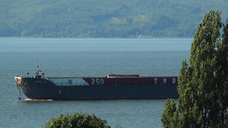 Tug-and-Barge-down-the-Columbia-River-toward-the-Pacific-Ocean