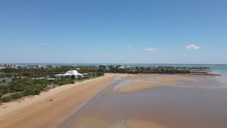 Distant-Slow-moving-Aerial-Drone-shot-of-Mindil-Beach,-Darwin,-Northern-Territory