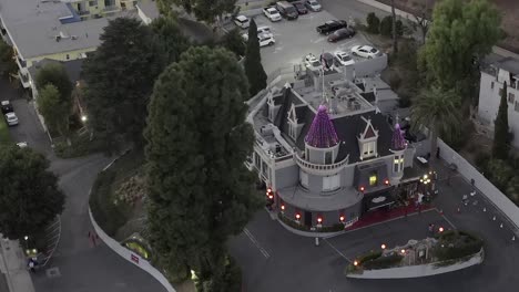 Aerial-static-view,-the-Magic-Castle-in-Hollywood-Hotel-and-club,-at-dusk