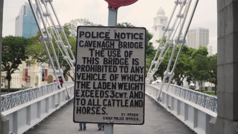 Police-Notice-Sign-At-The-Cavenagh-Bridge-Across-Singapore-River