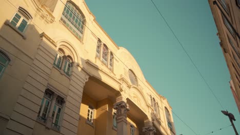 Lisbon-Alfama-medieval-vintage-street-with-ancient-facade-building-at-sunrise-4K