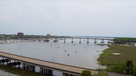 Aerial-Drone-Shot,-Boats-on-the-Water,-Cloudy-Day-Near-Charleston,-SC