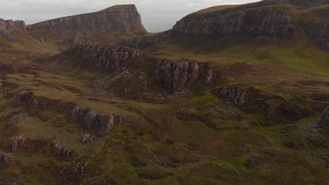 drone-shot-of-quiraing-landscape-mountains-and-hills-in-isle-of-skye-scotland