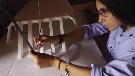 Woman-student-Working-As-Architect-Building-Housing-Model-Mock-Up