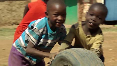 Poor-African-Children-playing-with-a-tire