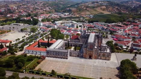 Aerial-orbit-shot-of-Batalha-Monastery,-Portugal