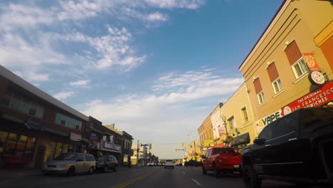 Time-lapse-of-a-car-driving-through-a-town