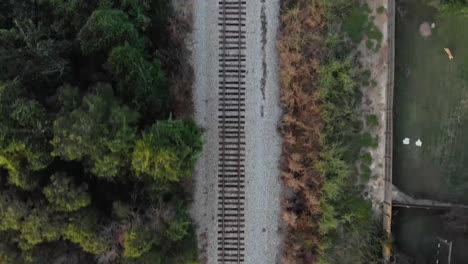 AERIAL:-Drone-looking-Straight-Down-at-Railroad-Tracks