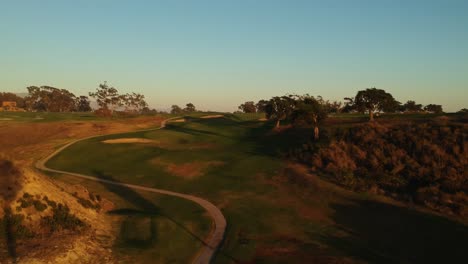 Aerial-view-of-the-golf-course-during-sunset