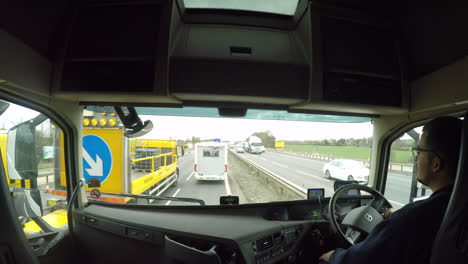 In-cab-view-of-passing-the-scene-of-an-accident-on-the-M1-motorway
