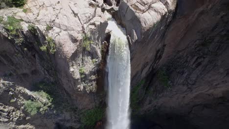 Aerial-orbit-shot-of-the-Basaseachi-waterfall-in-the-Candamena-Canyon,-Chihuahua