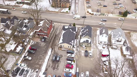 Drone-shot-of-a-busy-street-in-a-small-community