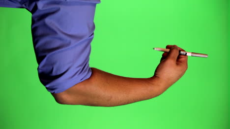 An-arm-in-front-of-a-green-screen-to-be-keyed-and-used-at-will