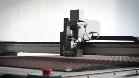Laser-cutting-machine-in-a-manufacturing-facility