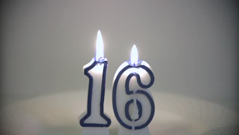 Number-16-Timelapse---Two-Birthday-Candles-Burning