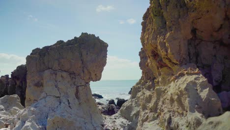 Nature-Sea-Ocean-Shore-Stones-Rocks-Waves-Waves-Crash-Sunny-Daylight-Portugal-Hole-Steady-Shot-4K
