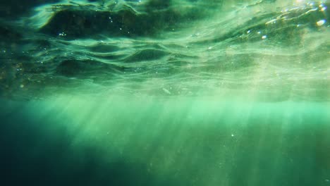 Ocean's-greenish-surface-seen-from-underwater