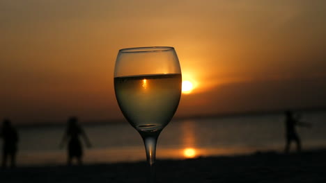 Drinking-a-glass-of-wine-on-the-Indian-Ocean-with-beautiful-a-beautiful-sunset