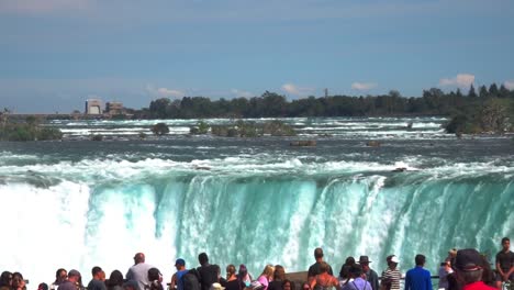 Tourists-overlooking-Niagara-Falls-in-the-background