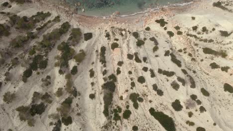 Aerial-view-moving-from-the-cliffs-to-the-mediterranean-ocean