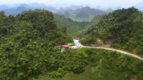 Drone-footage-of-motorcycles-riding-through-Vietnam's-Dong-Karst-Plateau-geopark