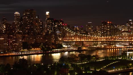 Time-Lapse-of-the-traffic-at-FDR-Drive,-Ed-Koch-Queensboro-Bridge,-Roosevelt-Island,-East-River-and-East-Side-Manhattan-at-night