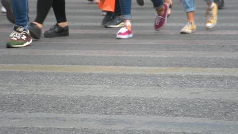 Concept-crowd-feet-with-shoes-closeup