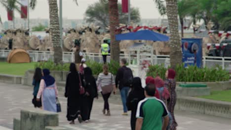 People-walking-in-slow-motion-on-Doha-Corniche