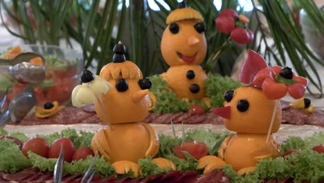 Food-decoration-with-figures-made-of-orange-peel