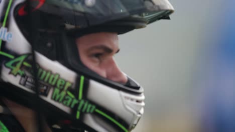 Young-driver-completely-focused-for-a-motorcycle-race