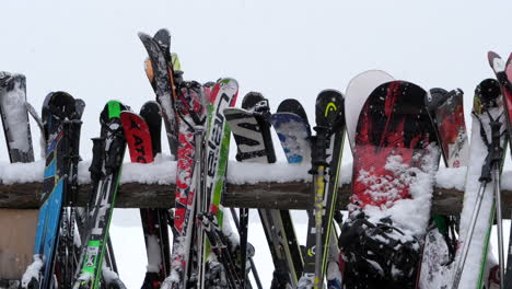 Skis-and-snowboards-on-rack-at-ski-resort
