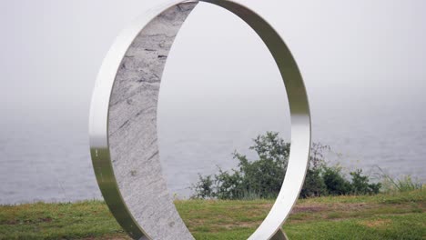 Phases-Of-The-Moon-Outdoor-Sculpture,-TILT-UP