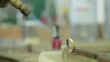 Close-ups-of-a-craftsman-making-jewellery-in-a-workshop