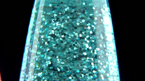 Close-Up-Tilt-of-Blue-Glitter-Lava-Lamp