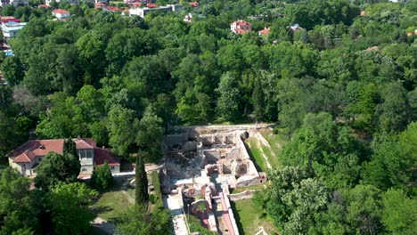 Aerial-view-of-the-ancient-Thermal-Baths-of-Diocletianopolis-during-a-sunny-day-in-town-of-Hisarya,-Bulgaria