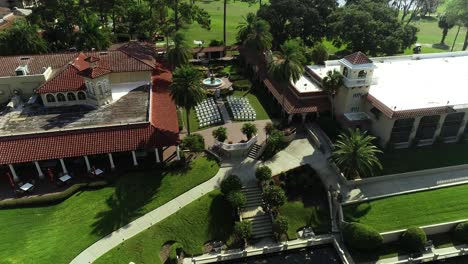 Aerial-View-of-Chairs-Set-Up-for-Wedding-Ceremony-at-Luxury-Resort-on-a-Sunny-Day-in-Florida