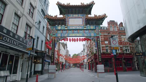 Lockdown-in-London,-Chinatown's-completely-empty-streets-with-stunning-Chinese-entrance-gateway,-during-the-Coronavirus-pandemic-2020