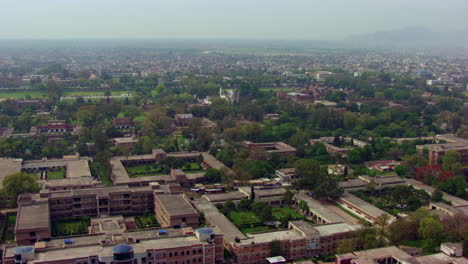 old-heritage-buildings-aerial-view-with-green-trees-and-city,-old-govt-officials-buildings,-Beautiful-parks-and-play-grounds,-Hills-in-the-city,-colourful-trees